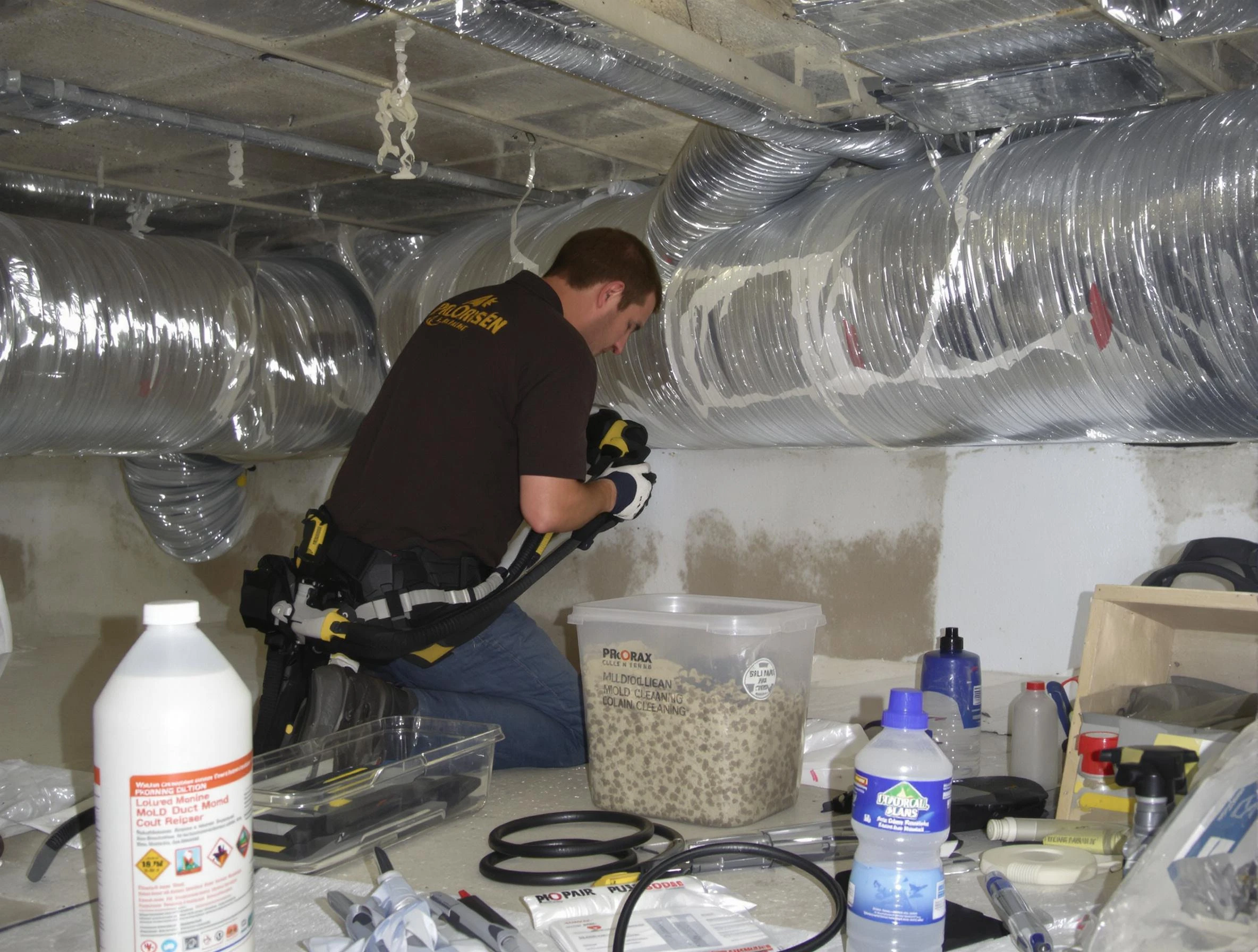 Parker Air Duct Cleaning specialist performing professional mold removal from air ducts in Parker